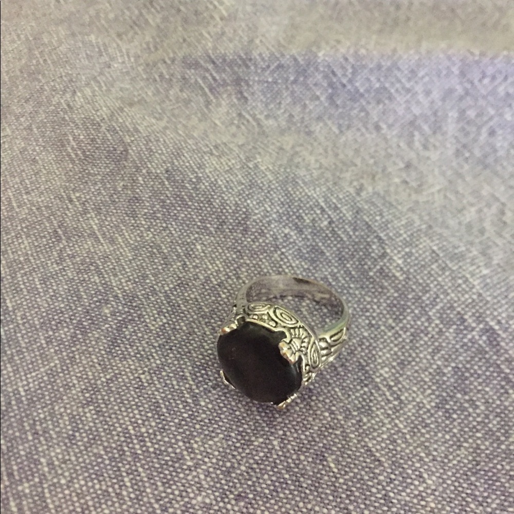 Silver ring with gray-ish stone